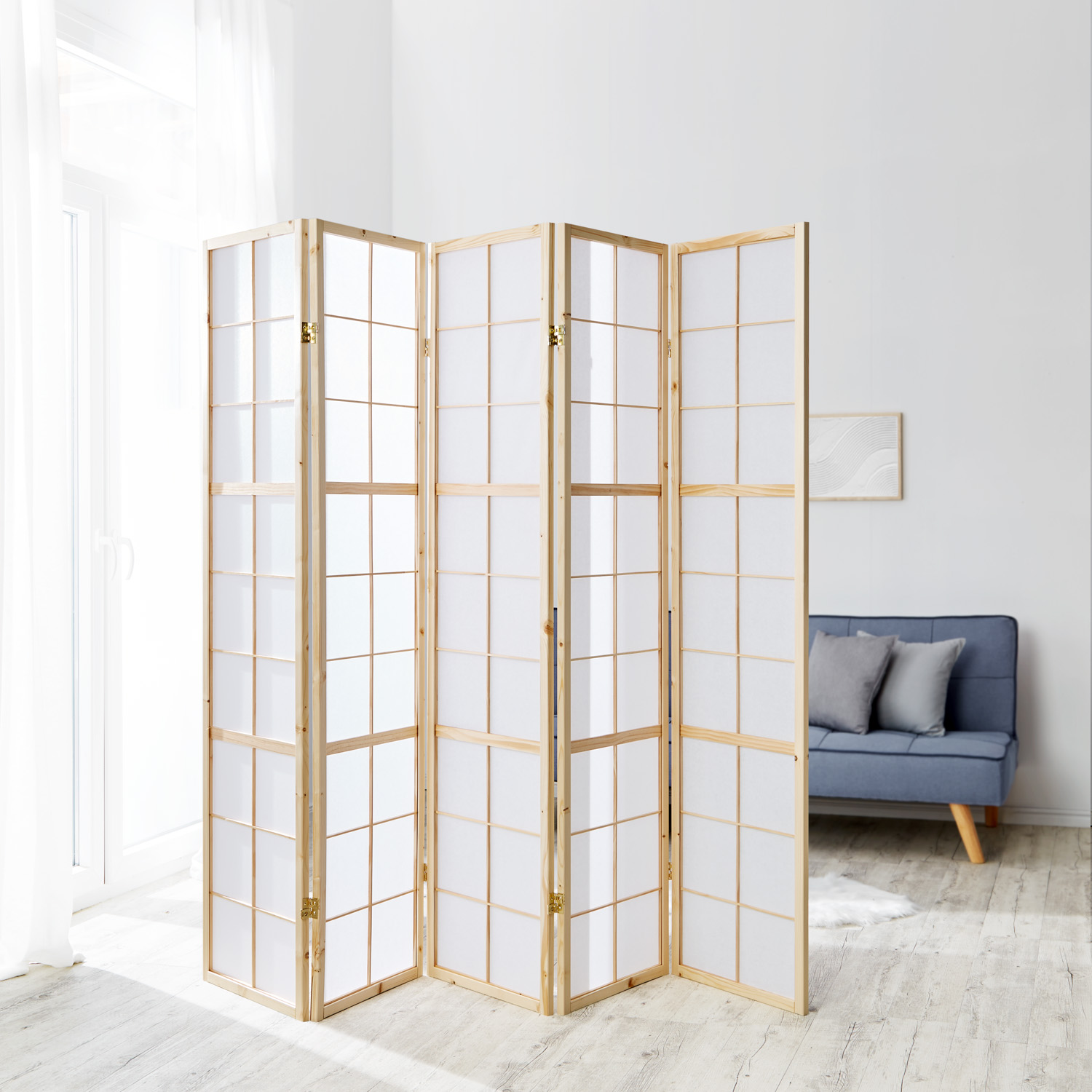 Five-panel Shoji screen made of light natural wood in a modern interior ? Japanese-style room divider with translucent rice paper and classic grid design, ideal for space separation in minimalist, Scandinavian-Asian living environments.