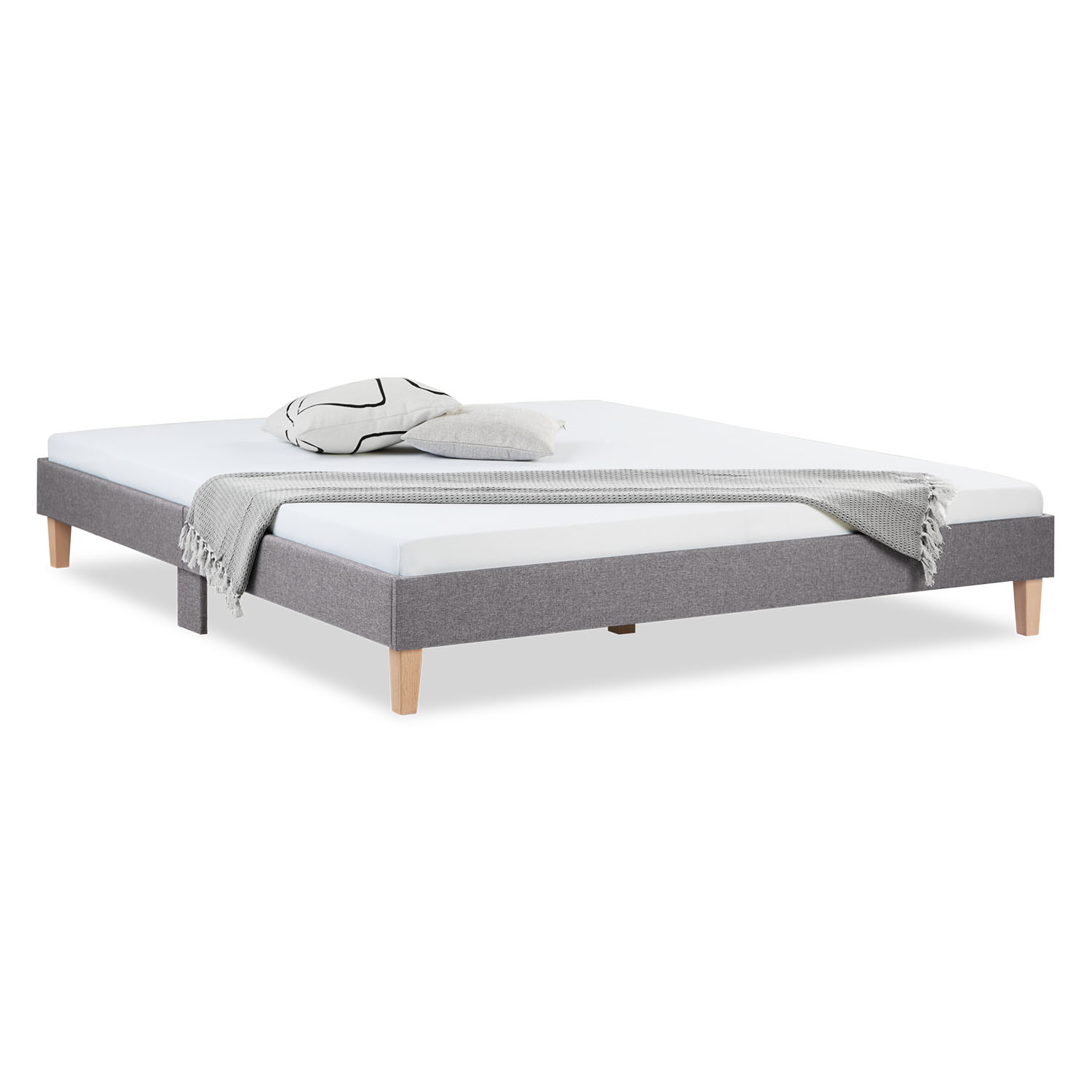 Modern low-profile bed frame with fabric upholstery and solid wood legs – Minimalist design for stylish bedrooms